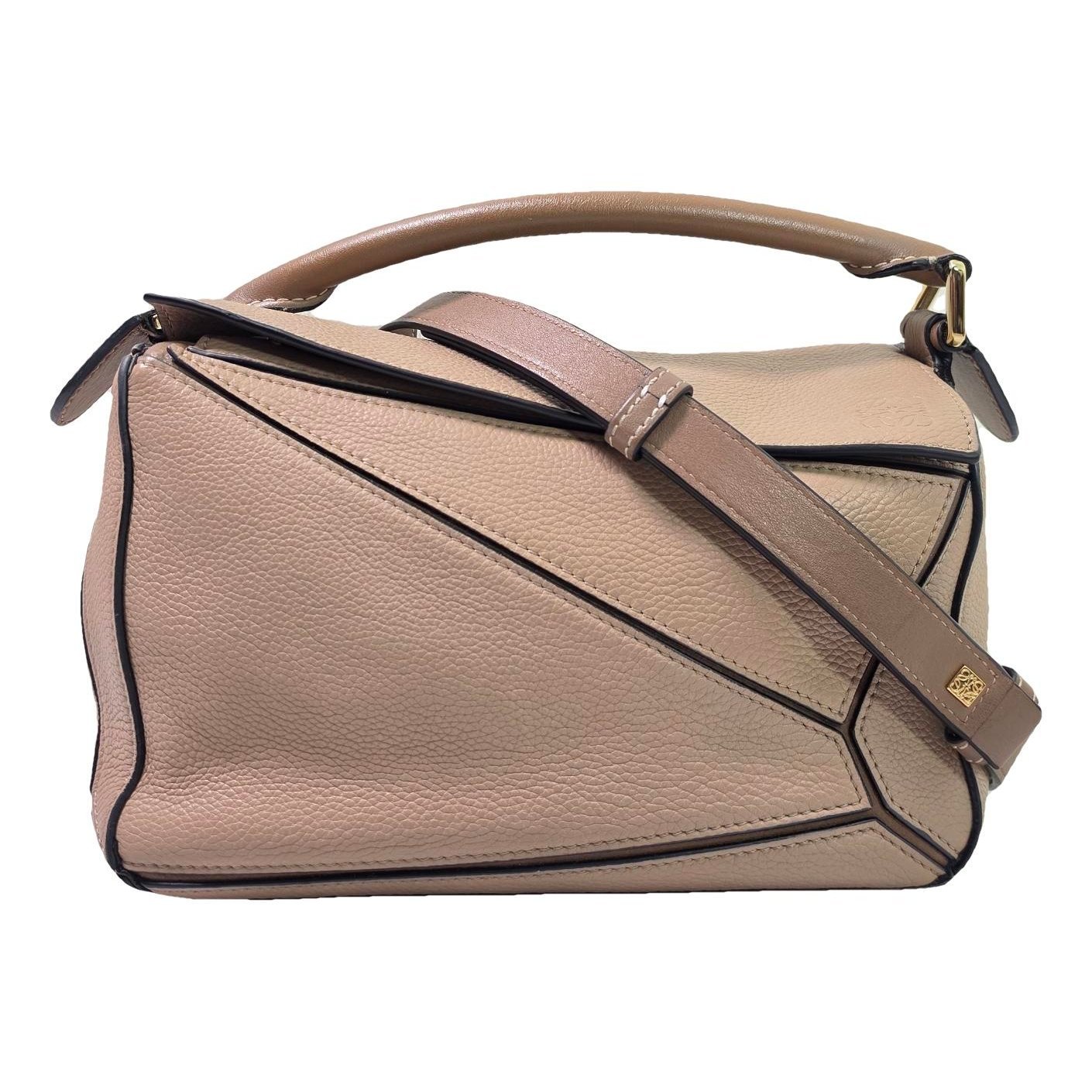 Puzzle leather handbag