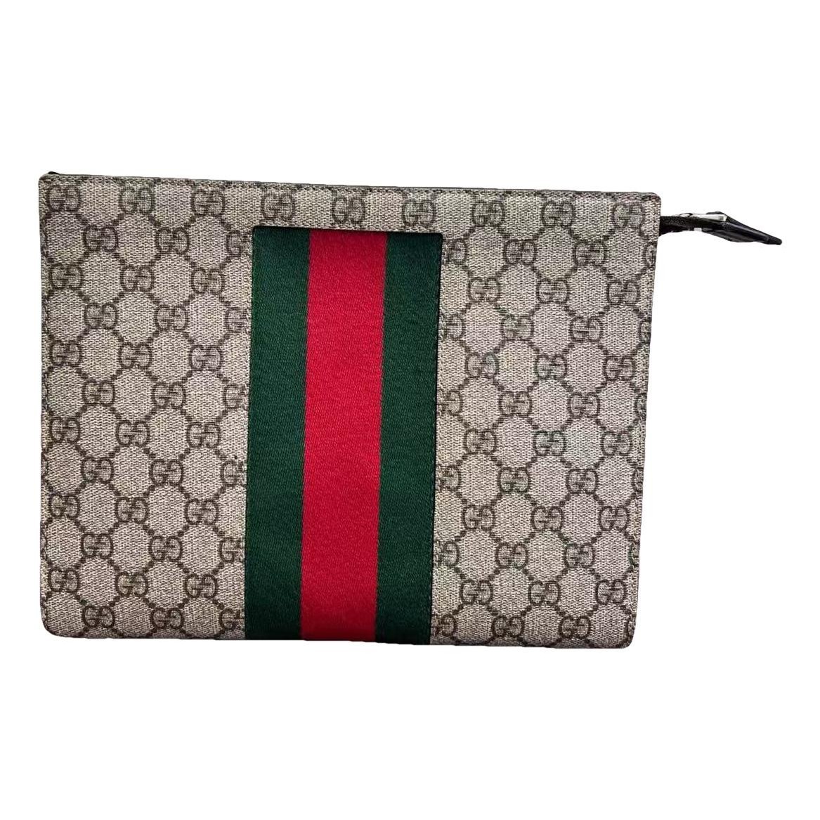 Ophidia cloth clutch bag