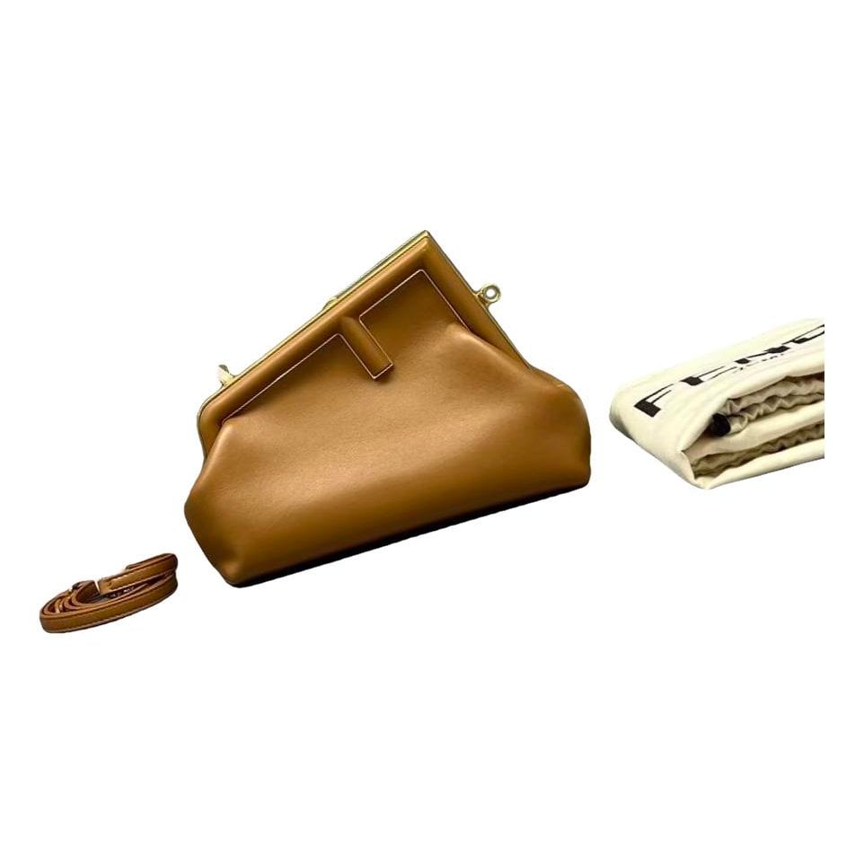First leather handbag
