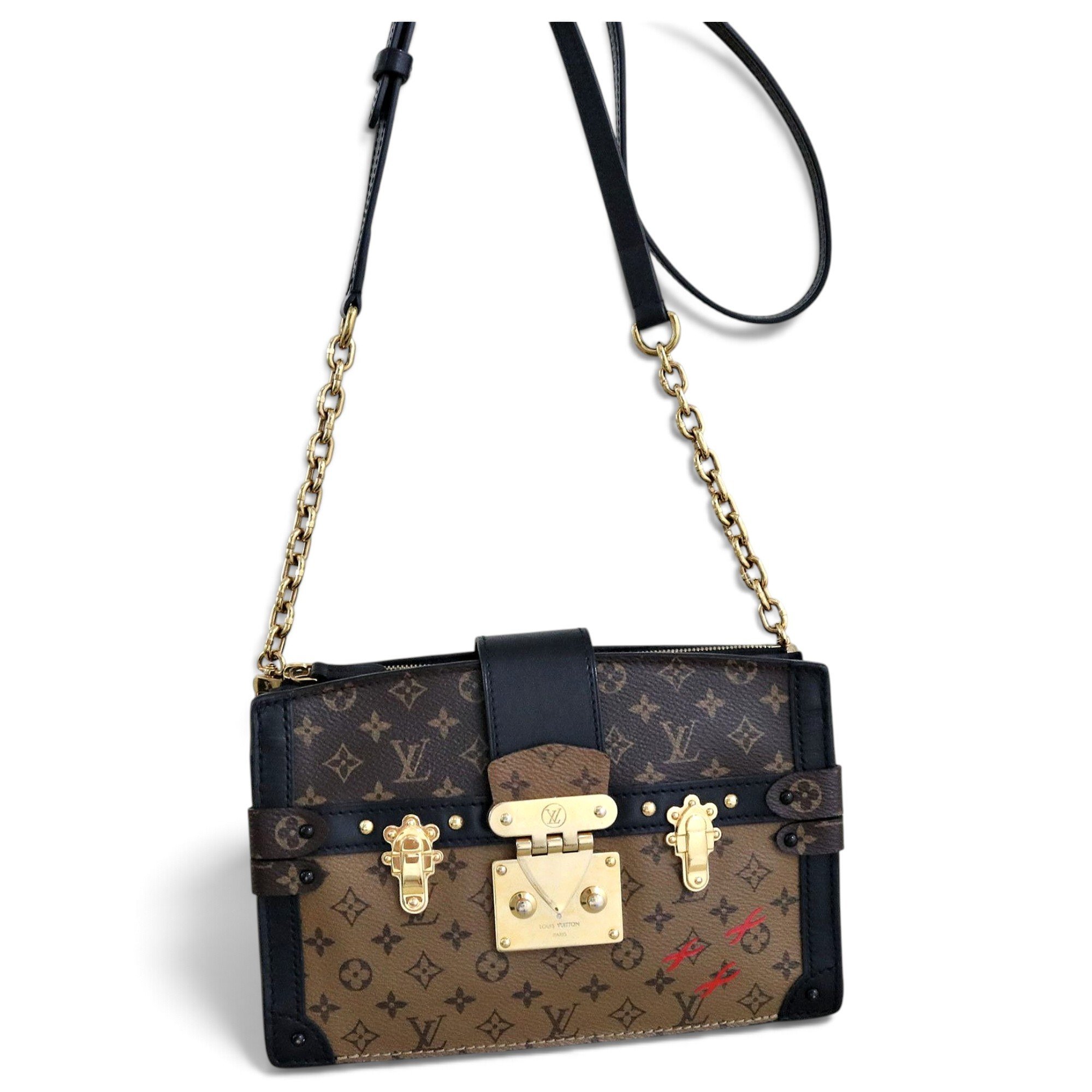 Pochette Trunk leather handbag