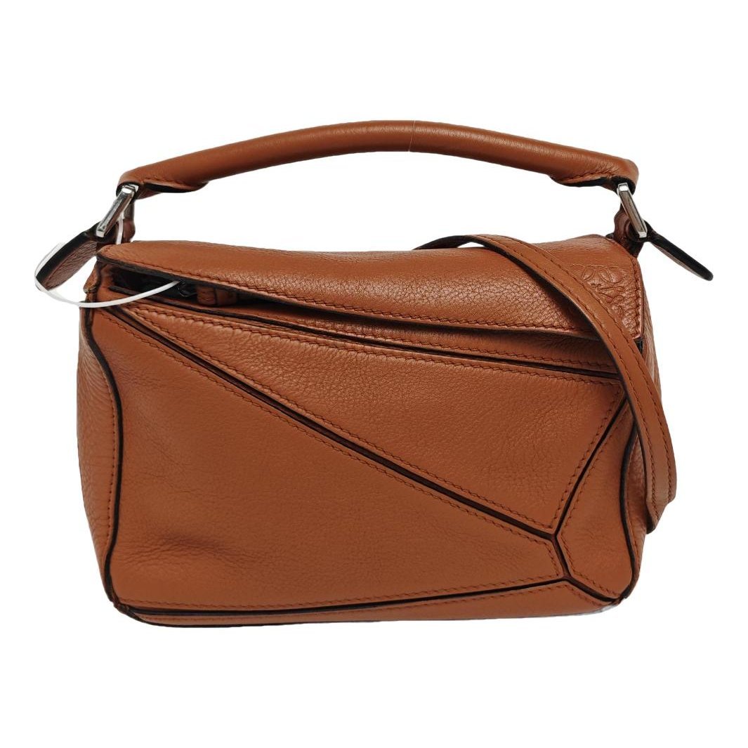 Puzzle leather handbag