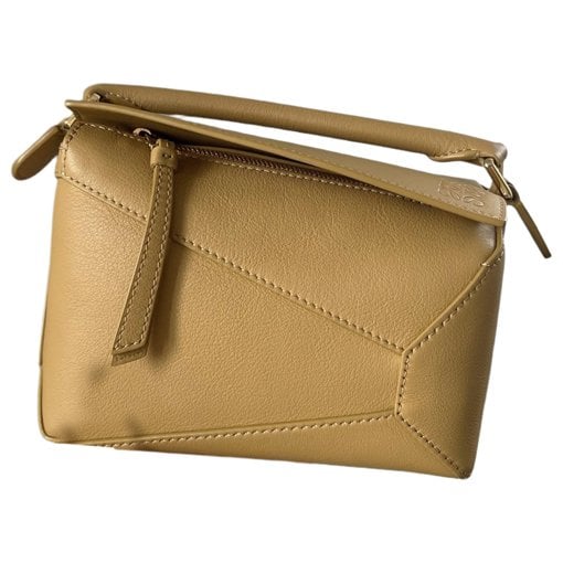 Puzzle leather handbag