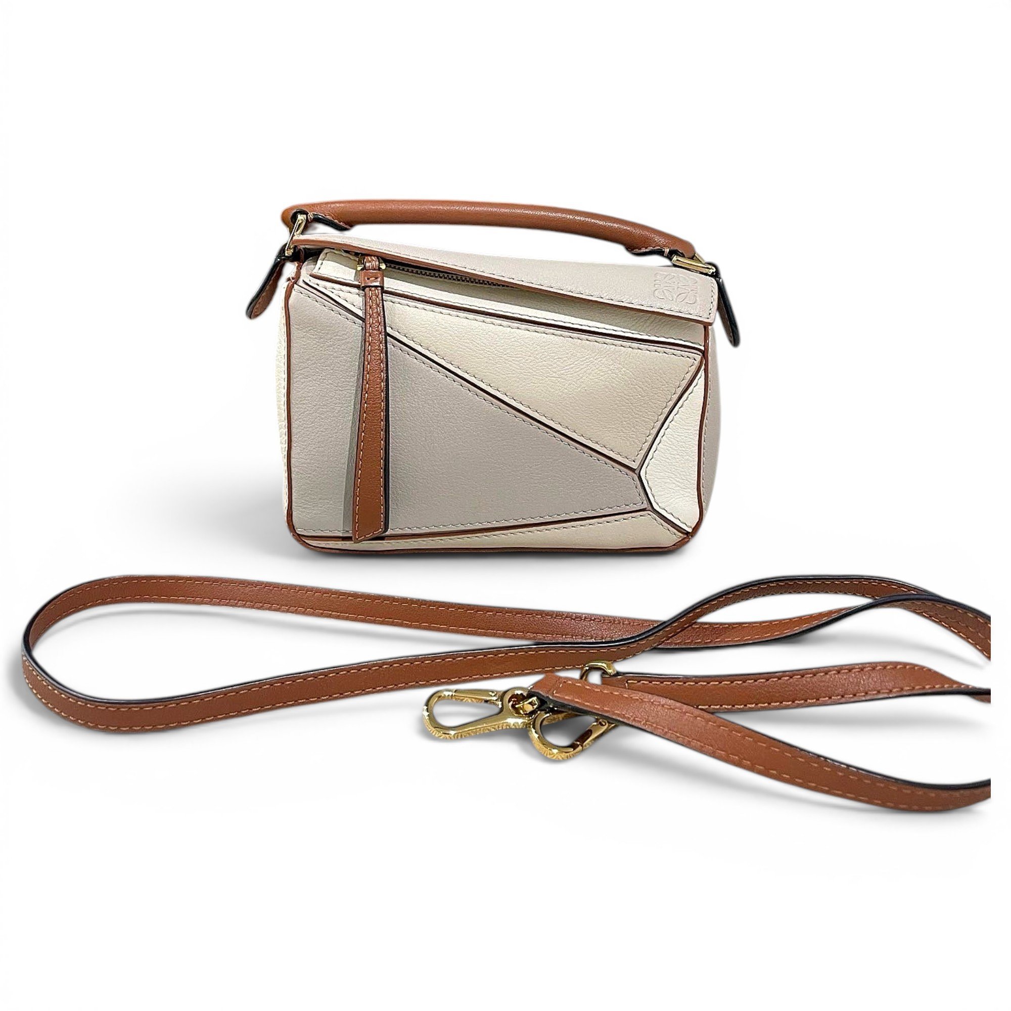Puzzle leather handbag