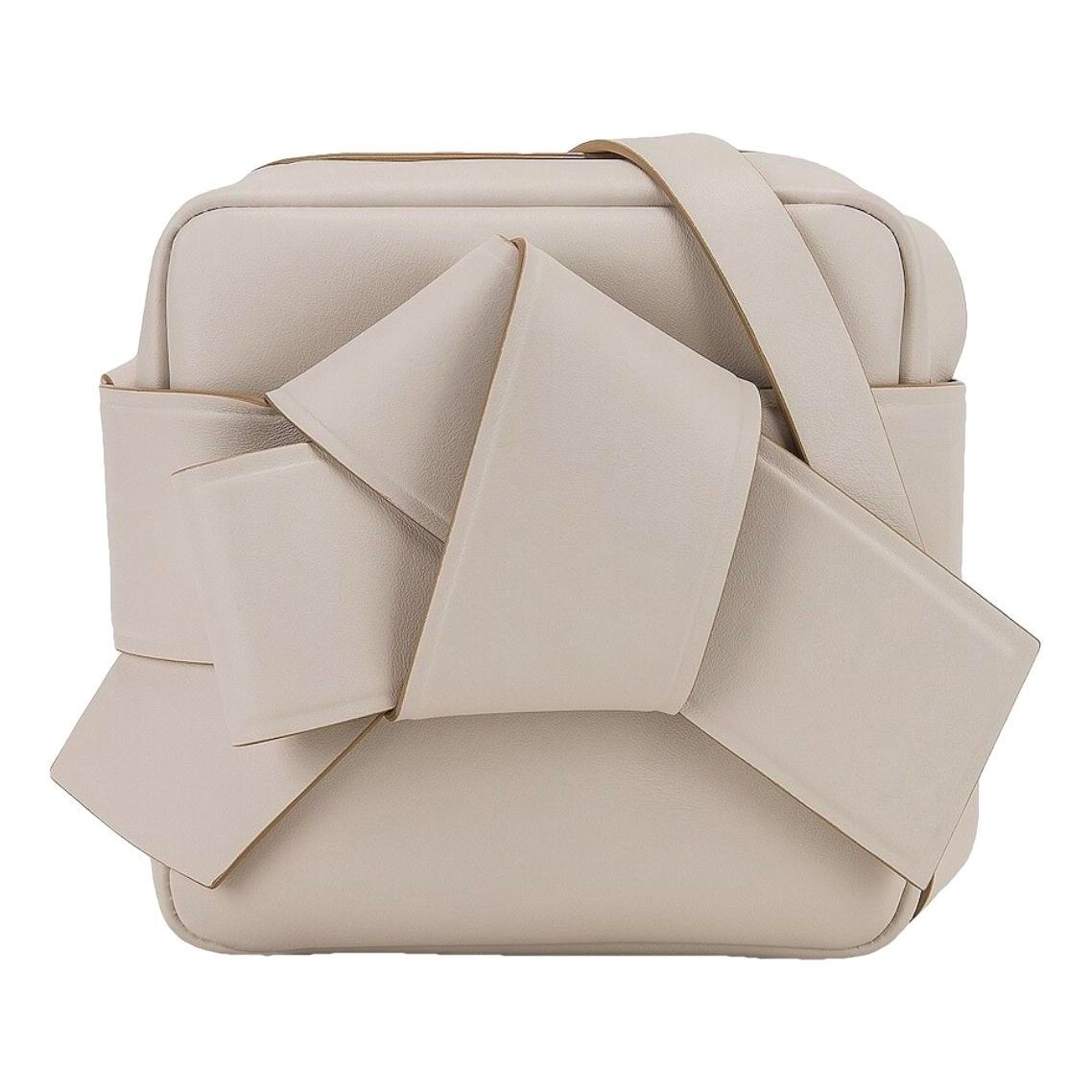 Musubi leather handbag