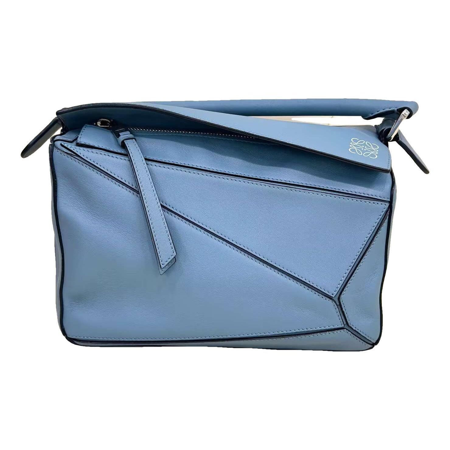 Puzzle leather handbag