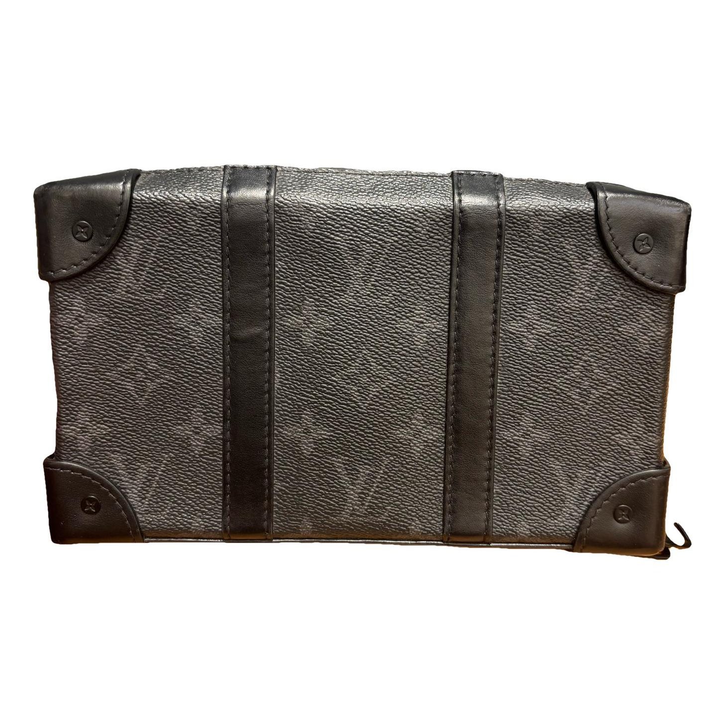 Pochette Trunk leather handbag