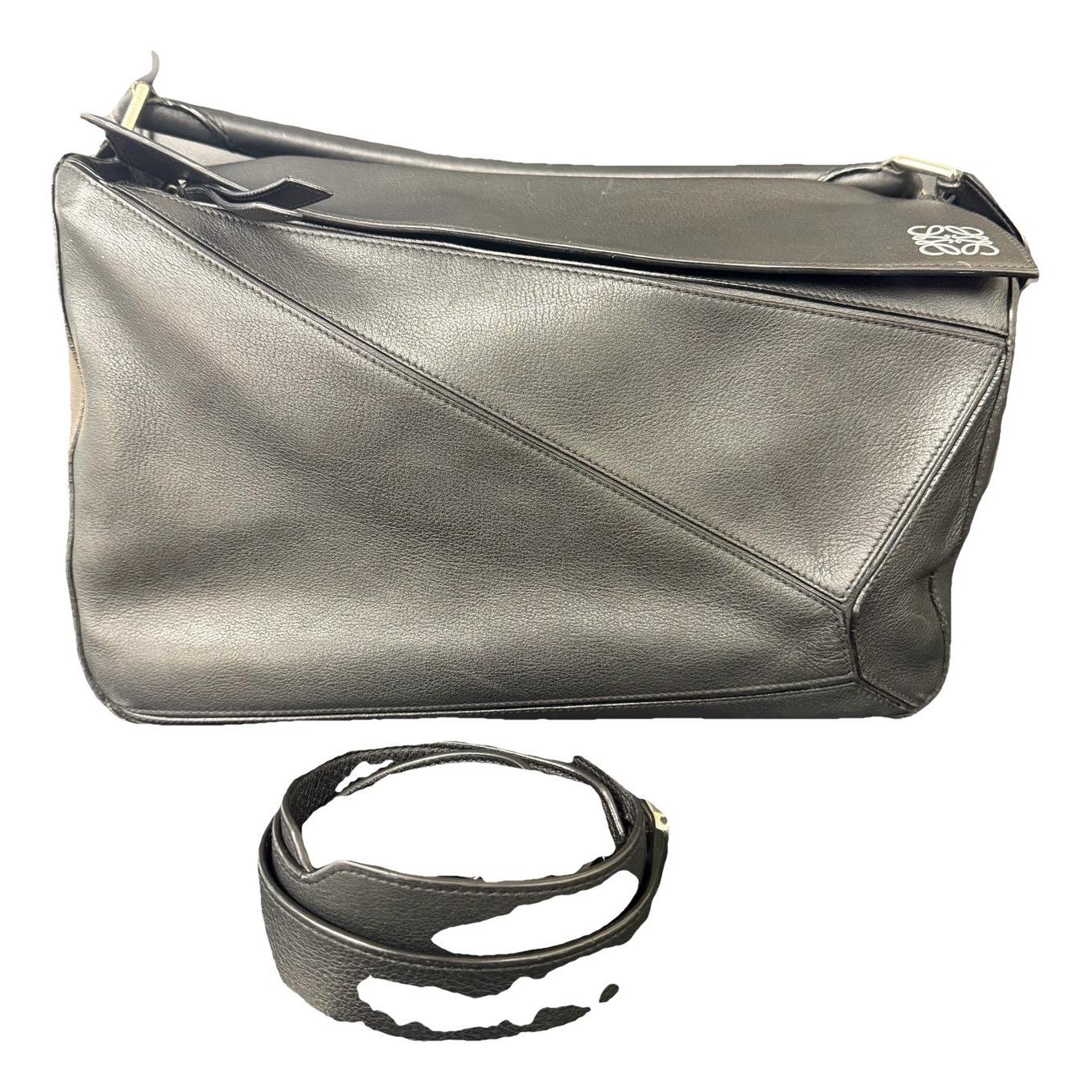 Puzzle leather handbag