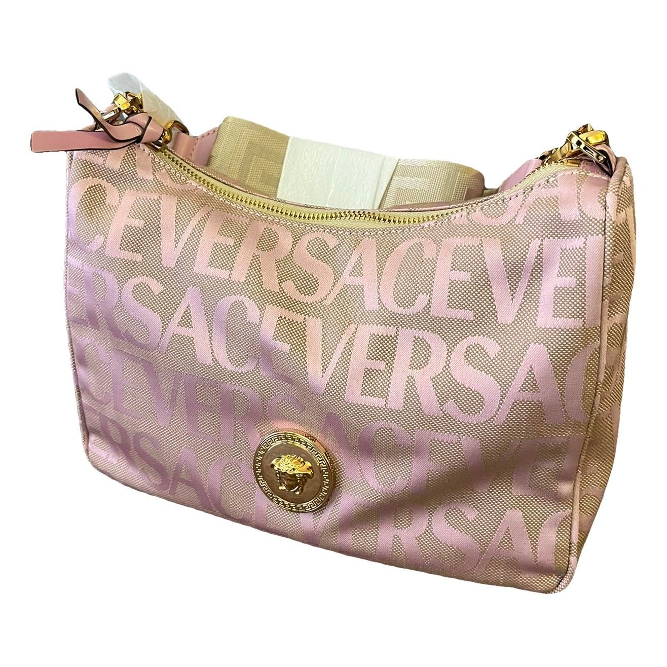 La Medusa cloth clutch bag