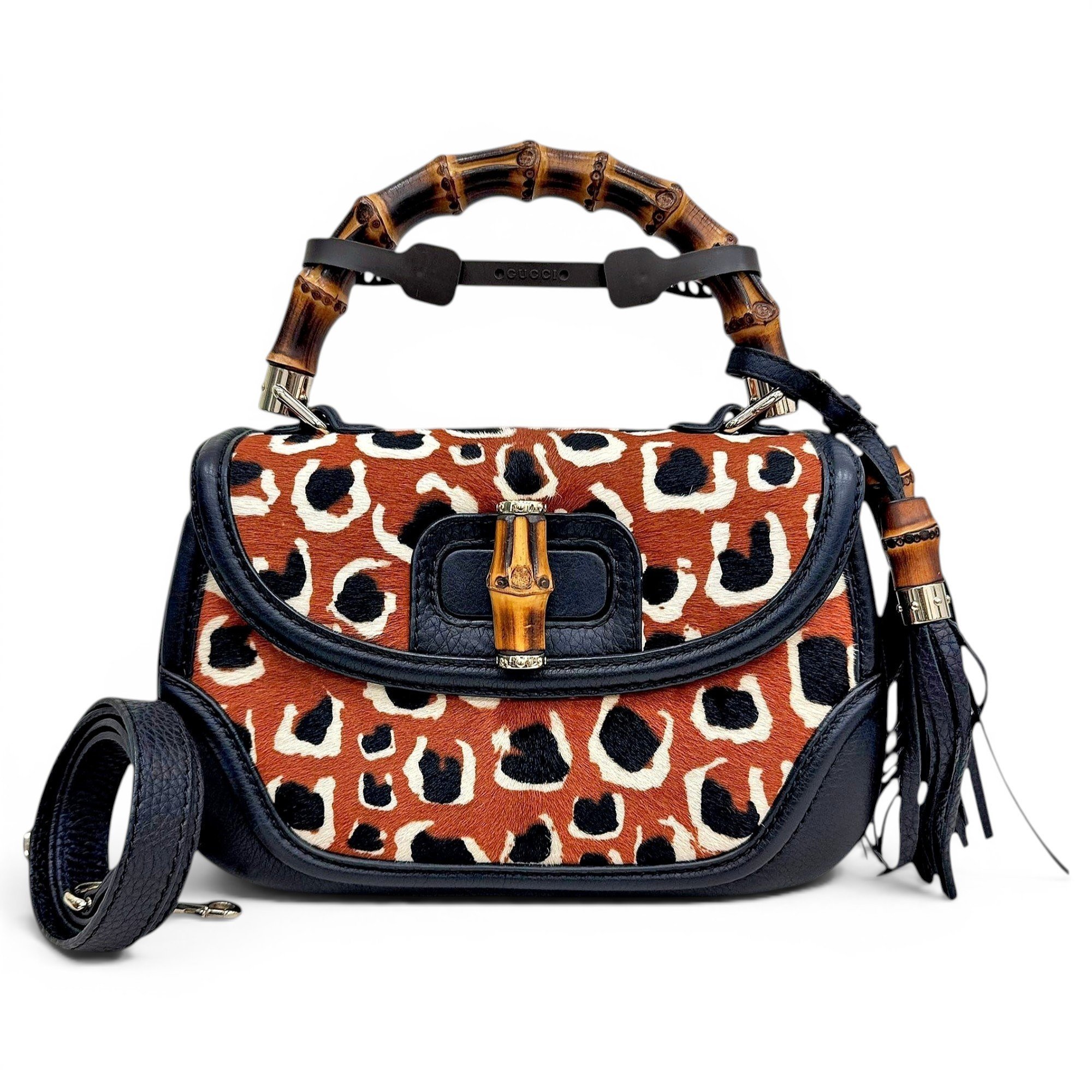 Convertible Pompon Bamboo Top Handle leather handbag