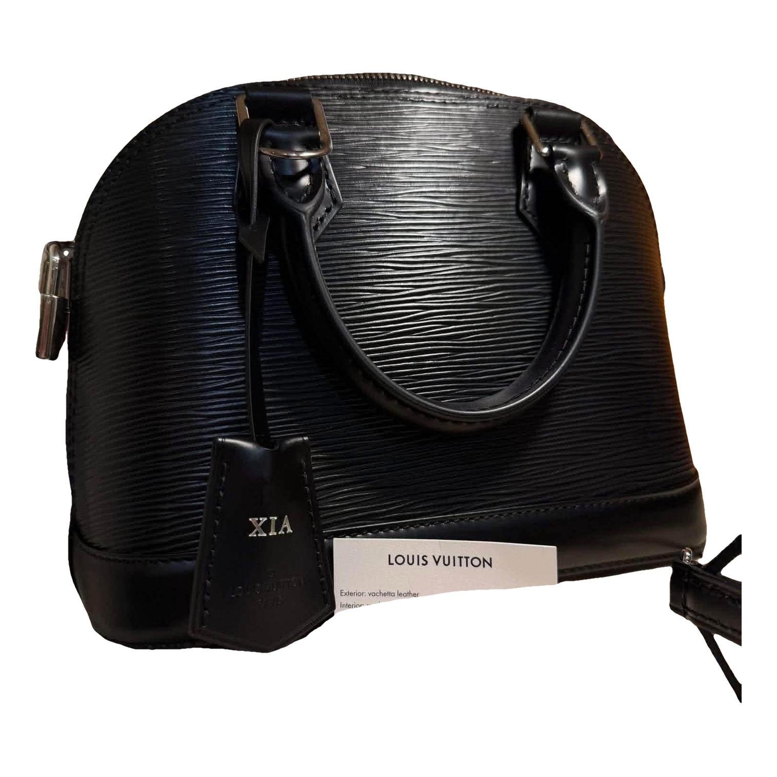 Louis Vuitton Alma BB leather handbag