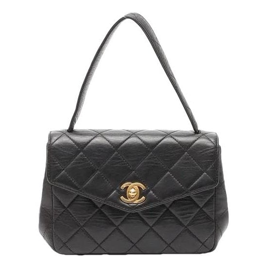 Trendy CC Top Handle leather handbag