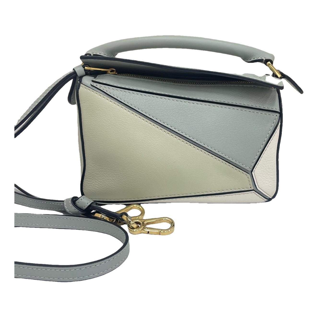 Puzzle leather handbag