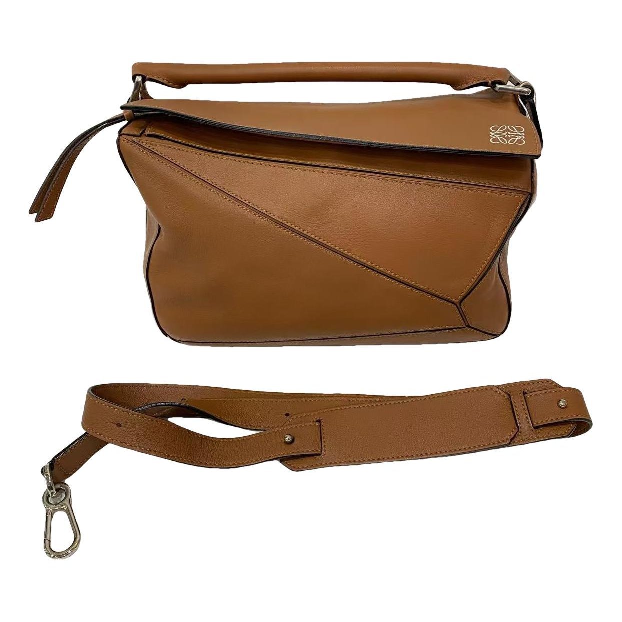 Puzzle leather handbag