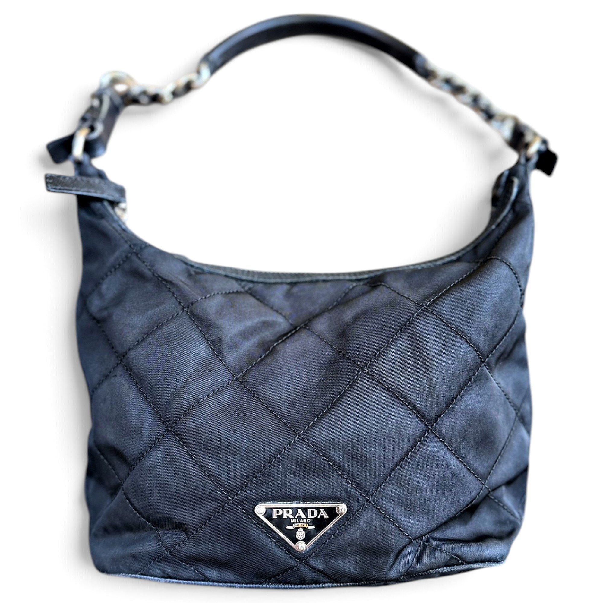 Re-edition clutch bag