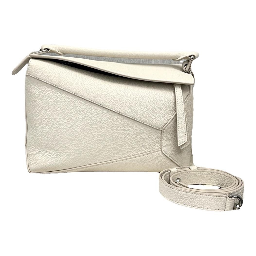 Puzzle leather handbag