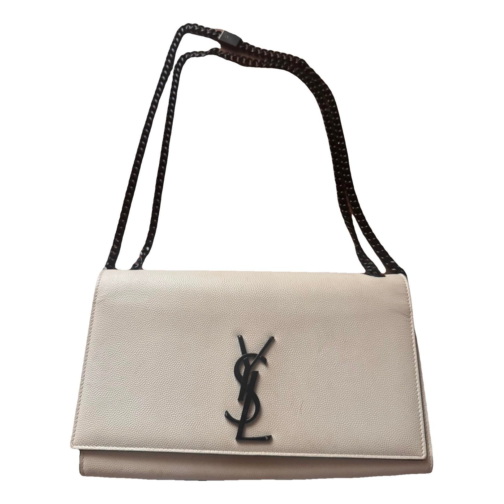 Kate monogramme leather clutch bag