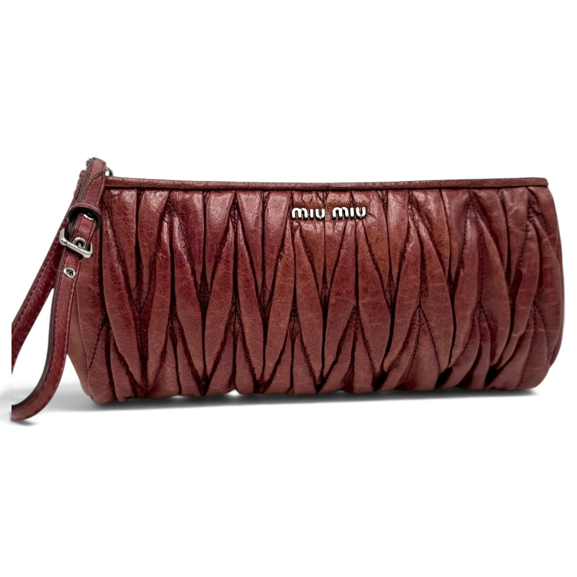 Matelassé leather clutch bag