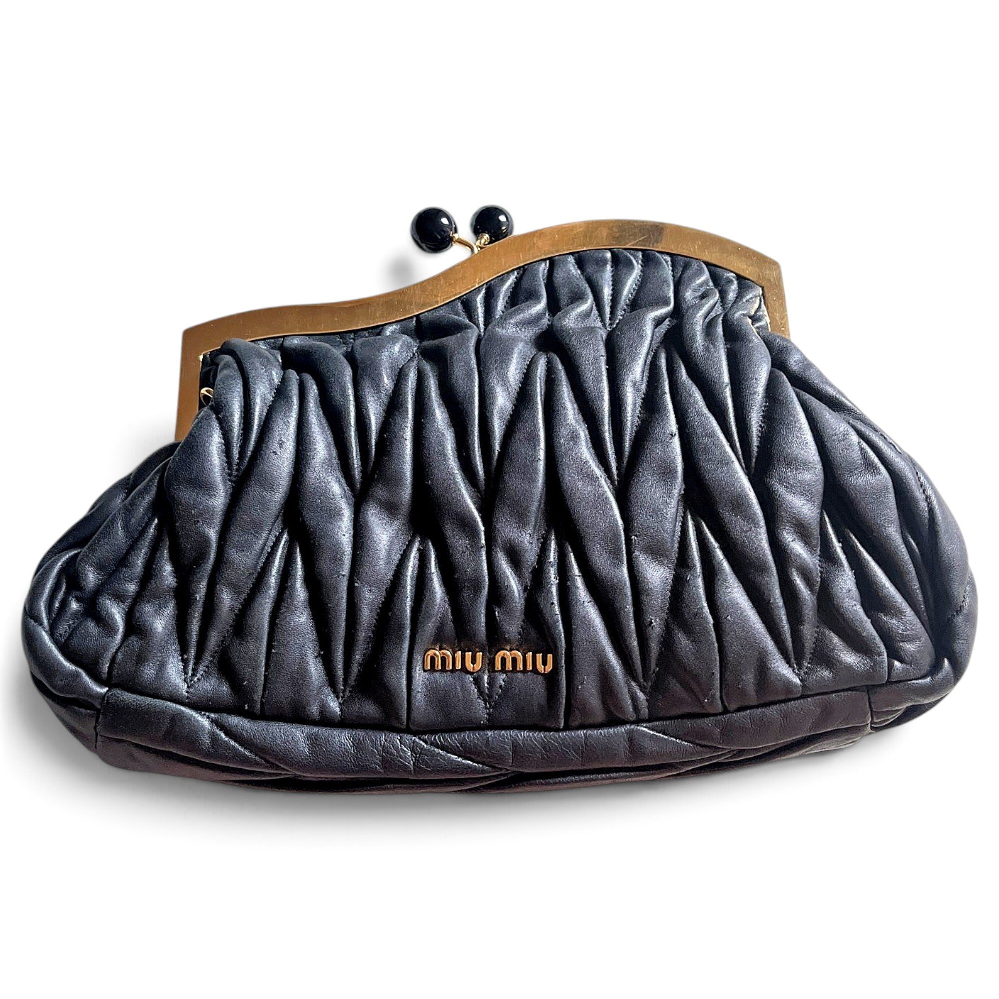 Matelassé leather clutch bag