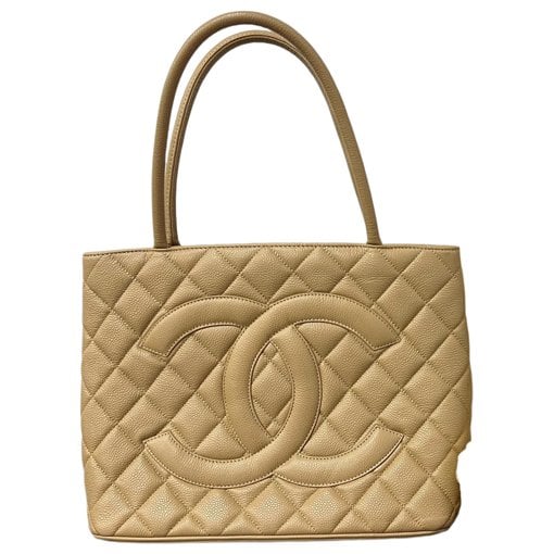 Médaillon leather handbag