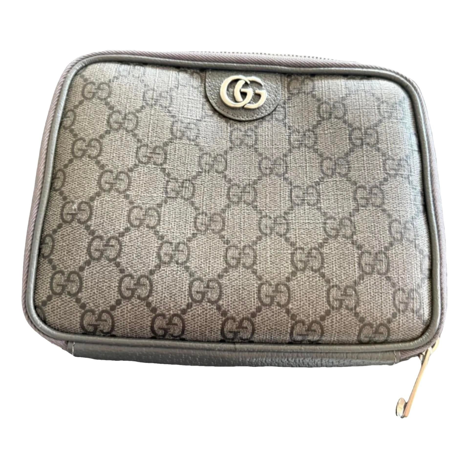 Ophidia leather clutch bag