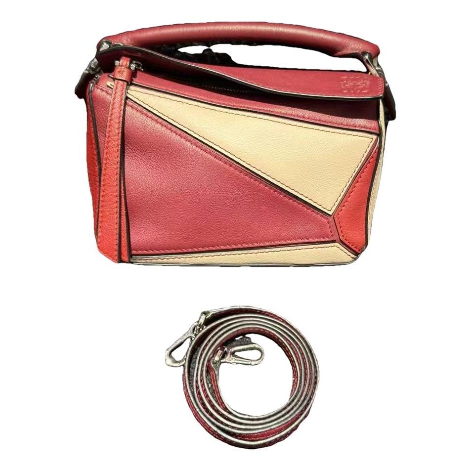 Puzzle leather handbag