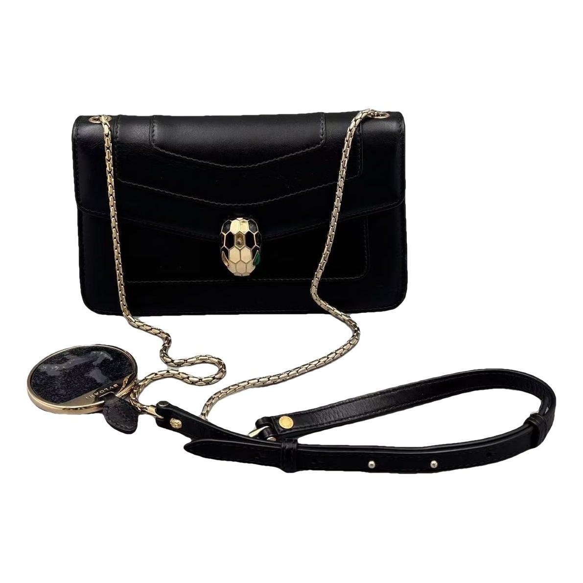 Serpenti leather handbag
