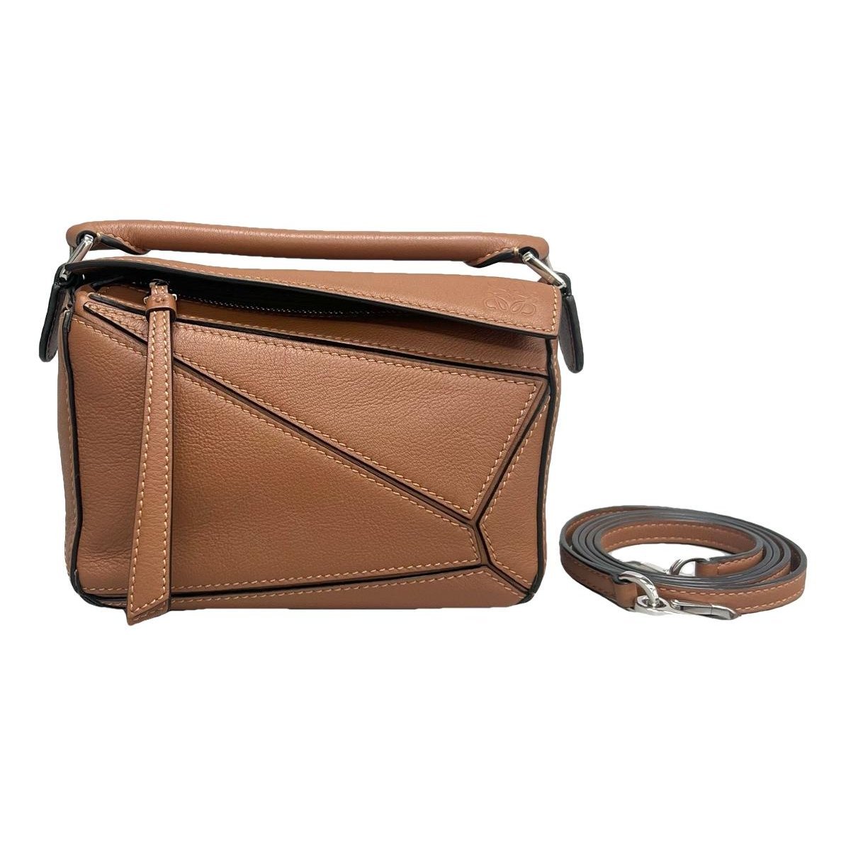 Puzzle leather handbag