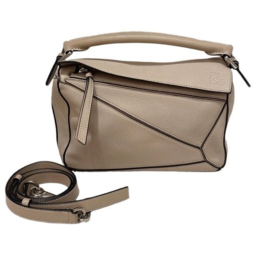 Puzzle leather handbag