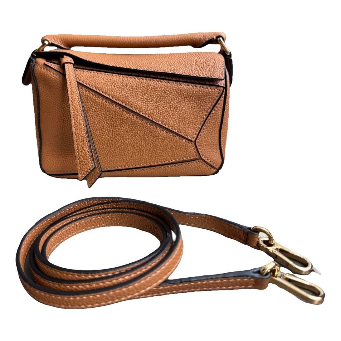 Puzzle leather handbag