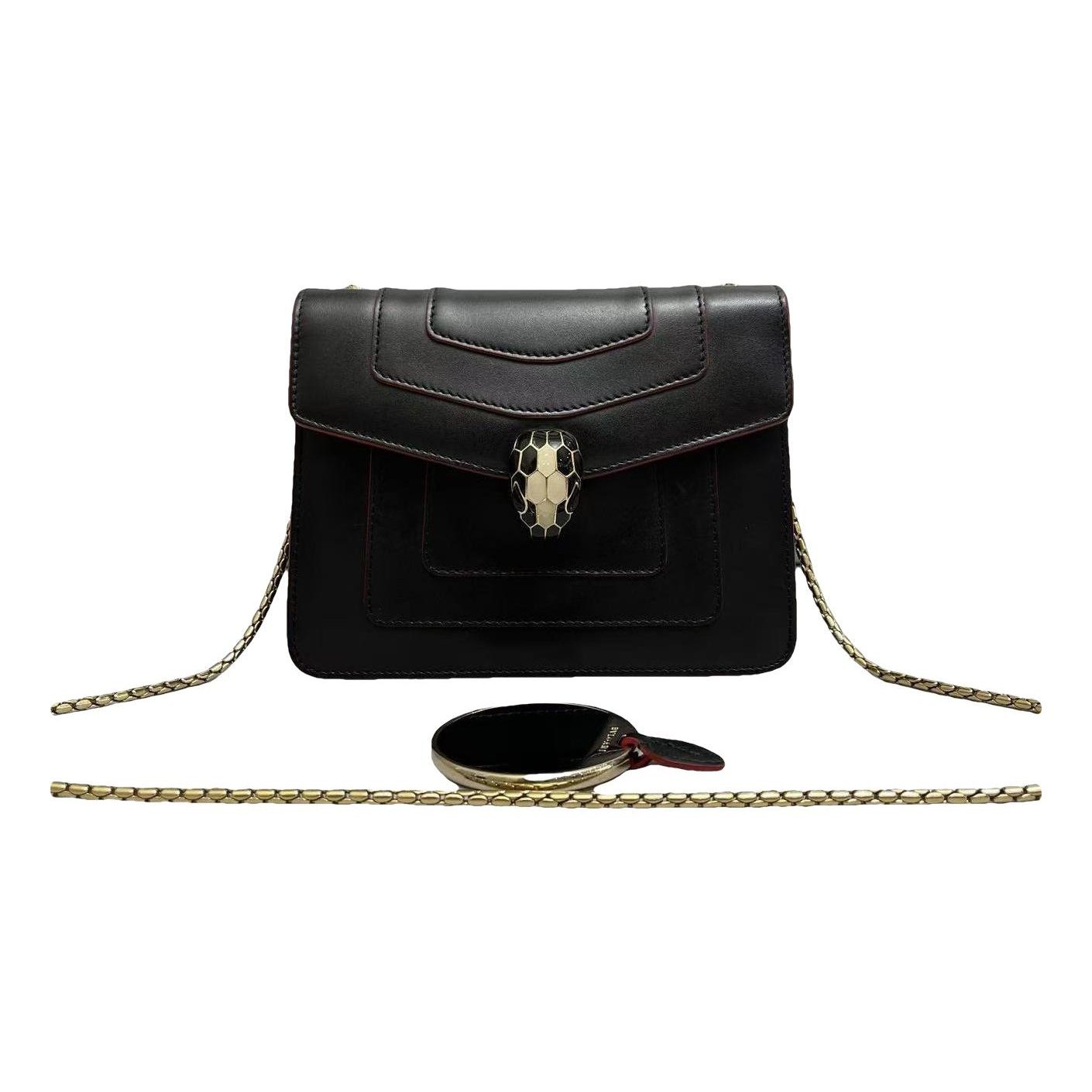 Serpenti leather handbag