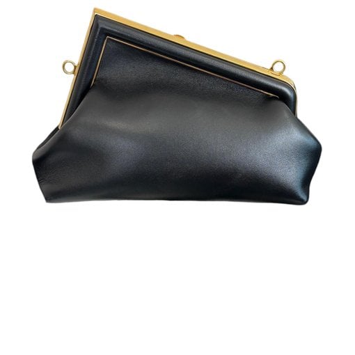 First leather handbag