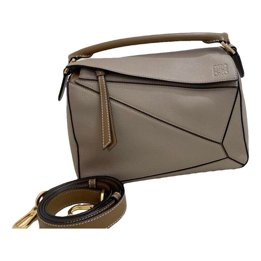 Puzzle leather handbag