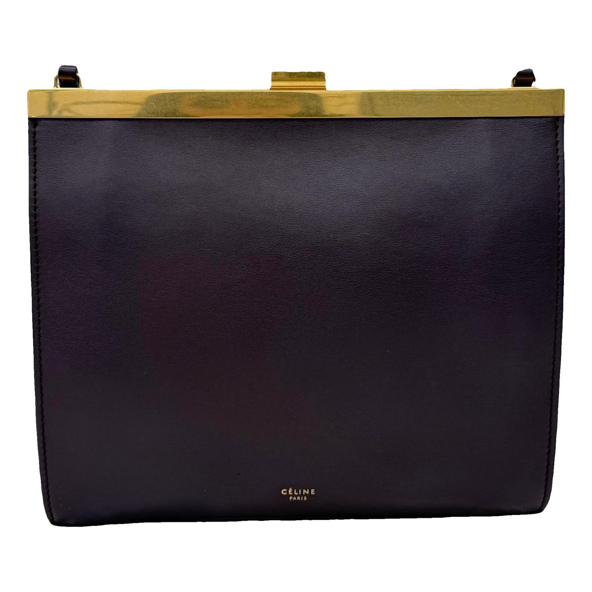 Clasp leather handbag