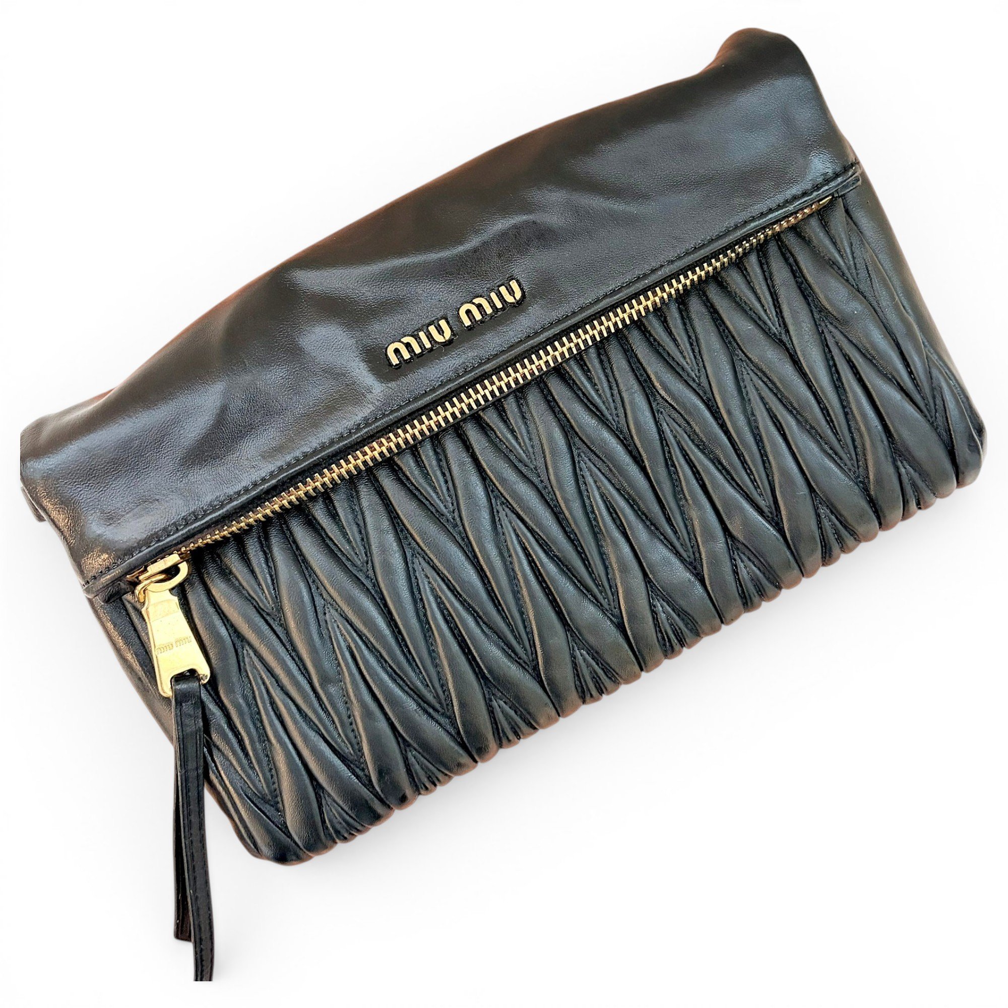 Matelassé leather clutch bag