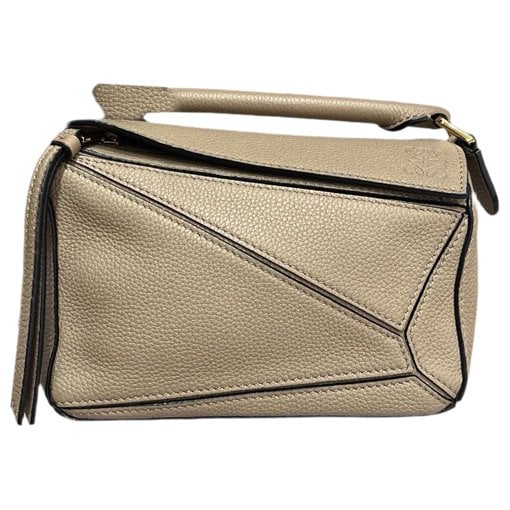 Puzzle leather handbag