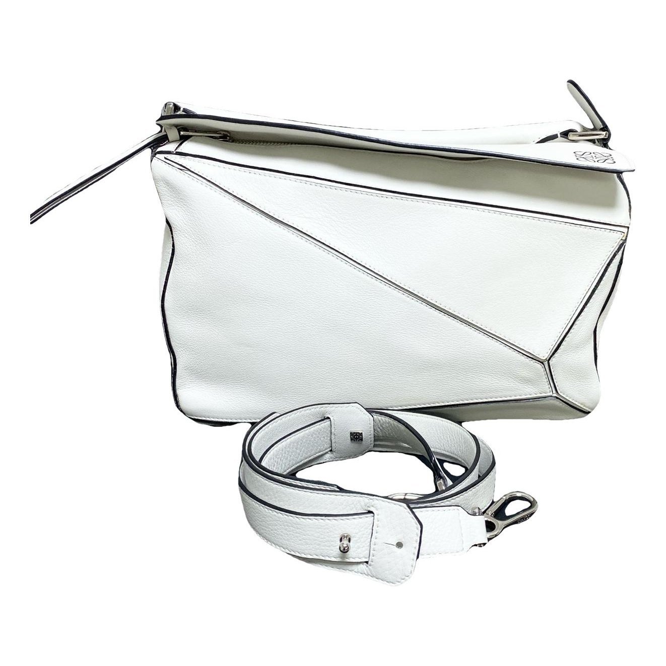 Puzzle leather handbag