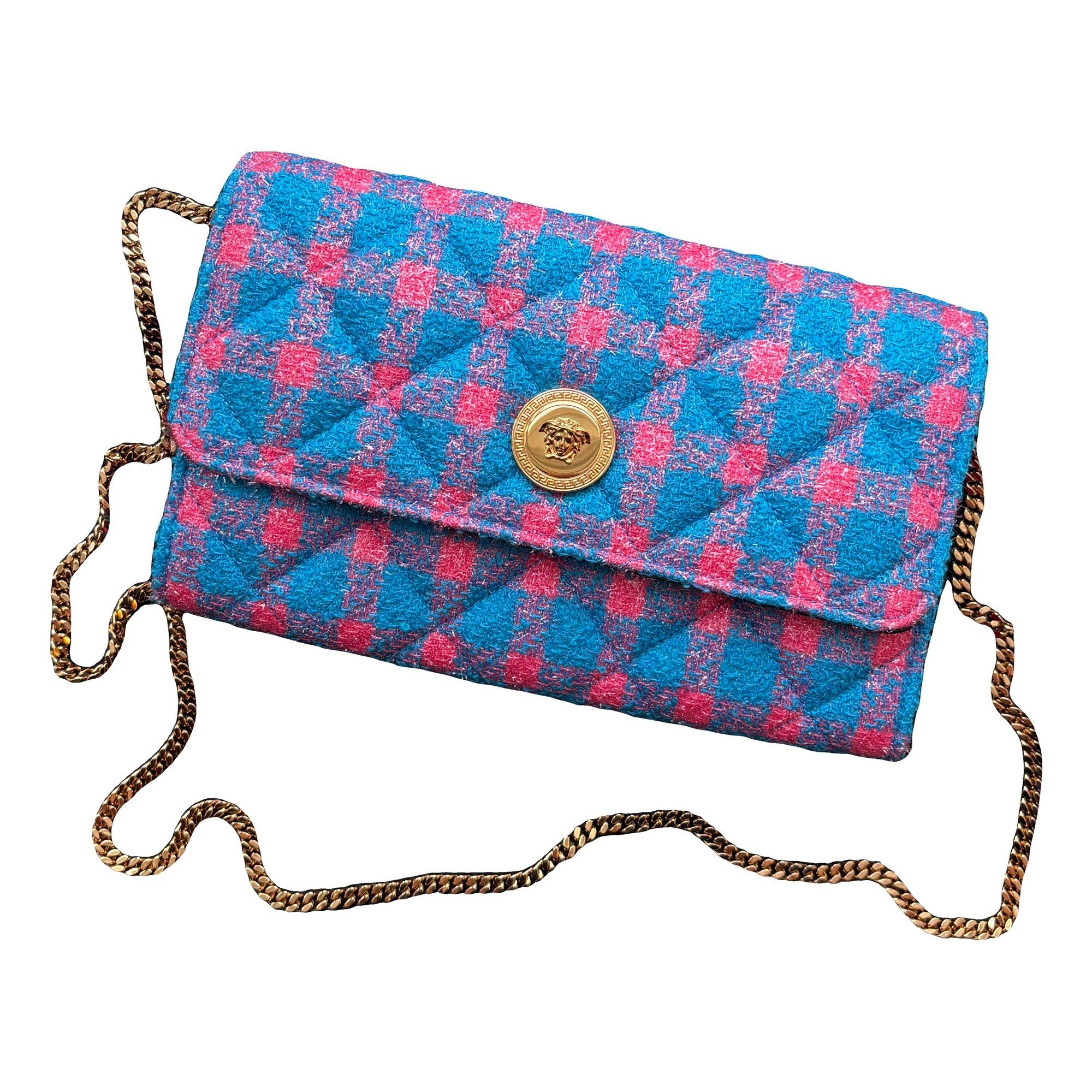 La Medusa tweed clutch bag