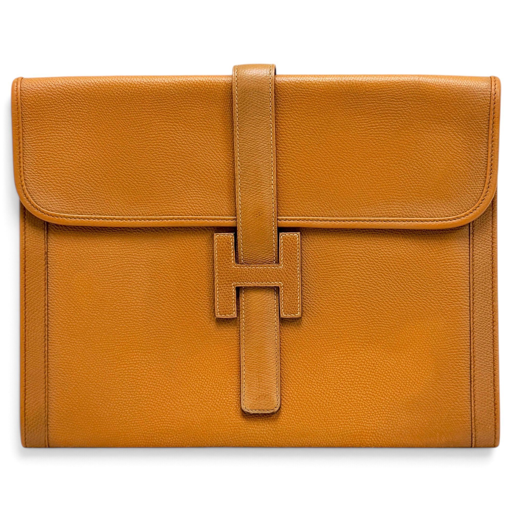 Jige leather clutch bag