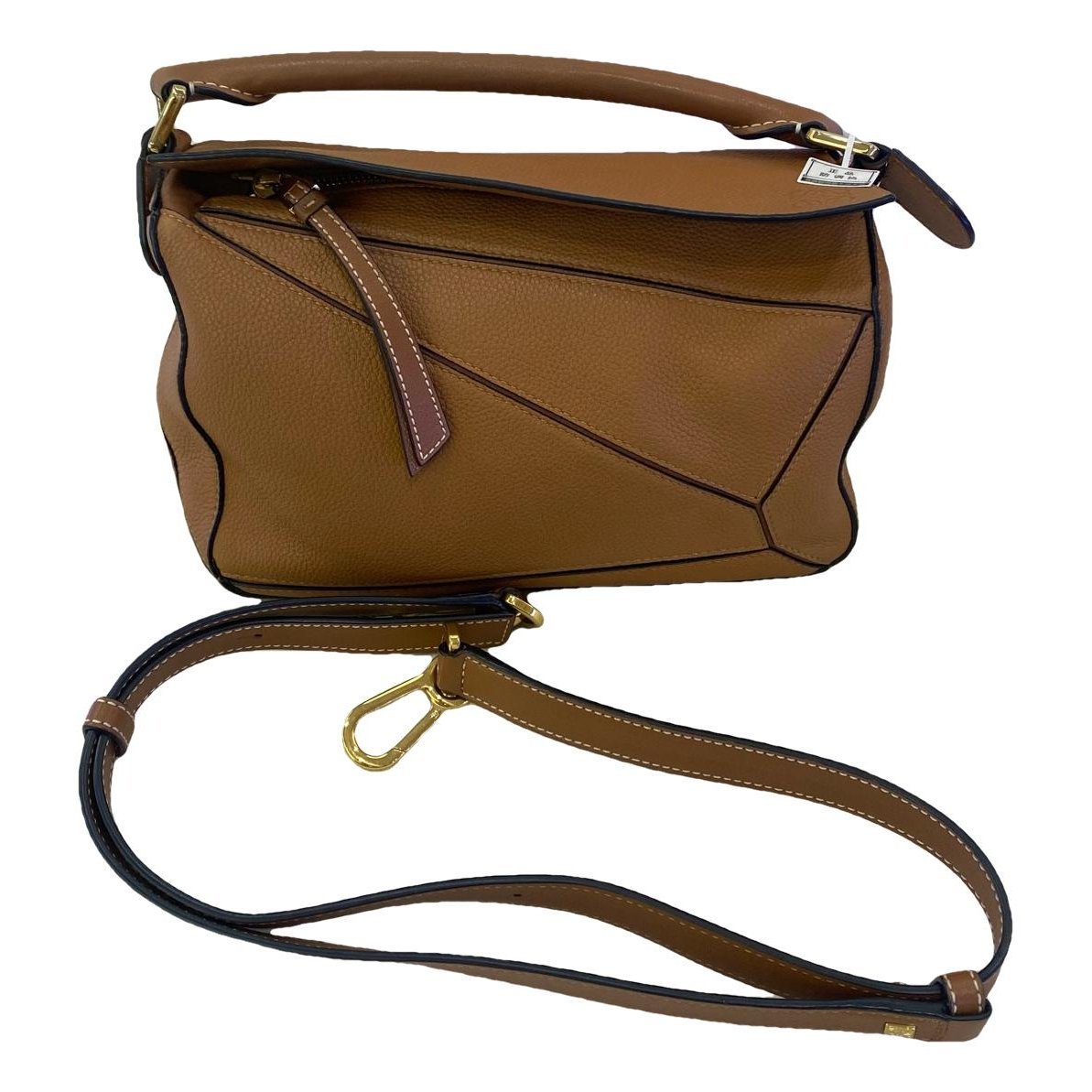 Puzzle leather handbag