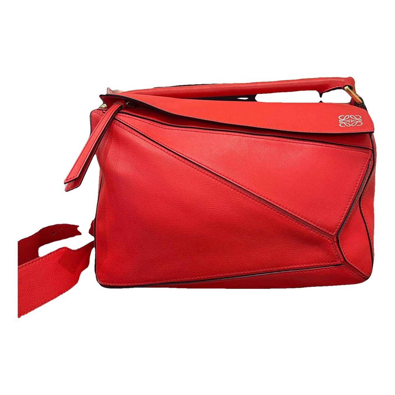 Puzzle leather handbag