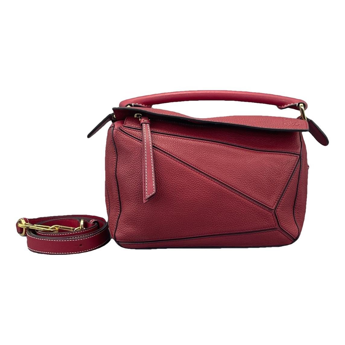 Puzzle leather handbag