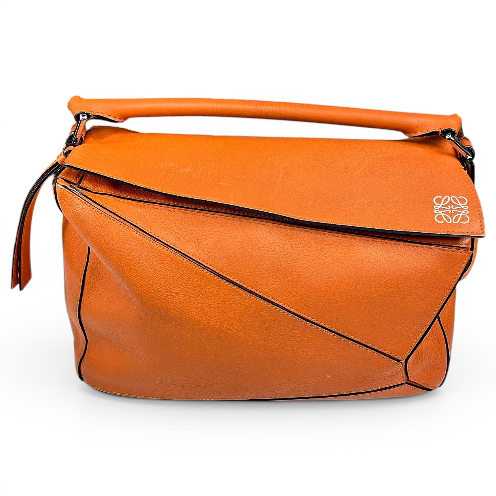 Puzzle leather handbag