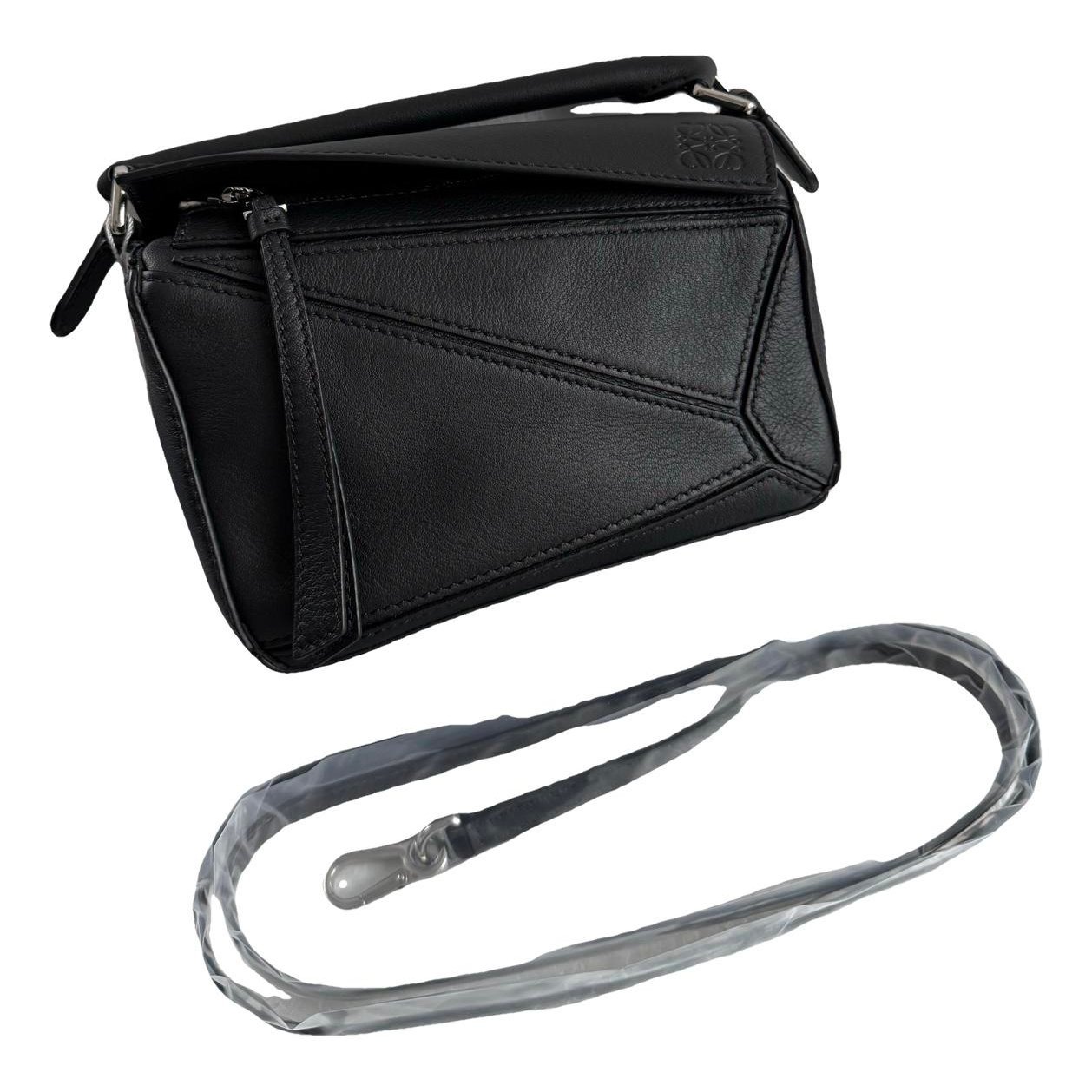 Puzzle leather handbag