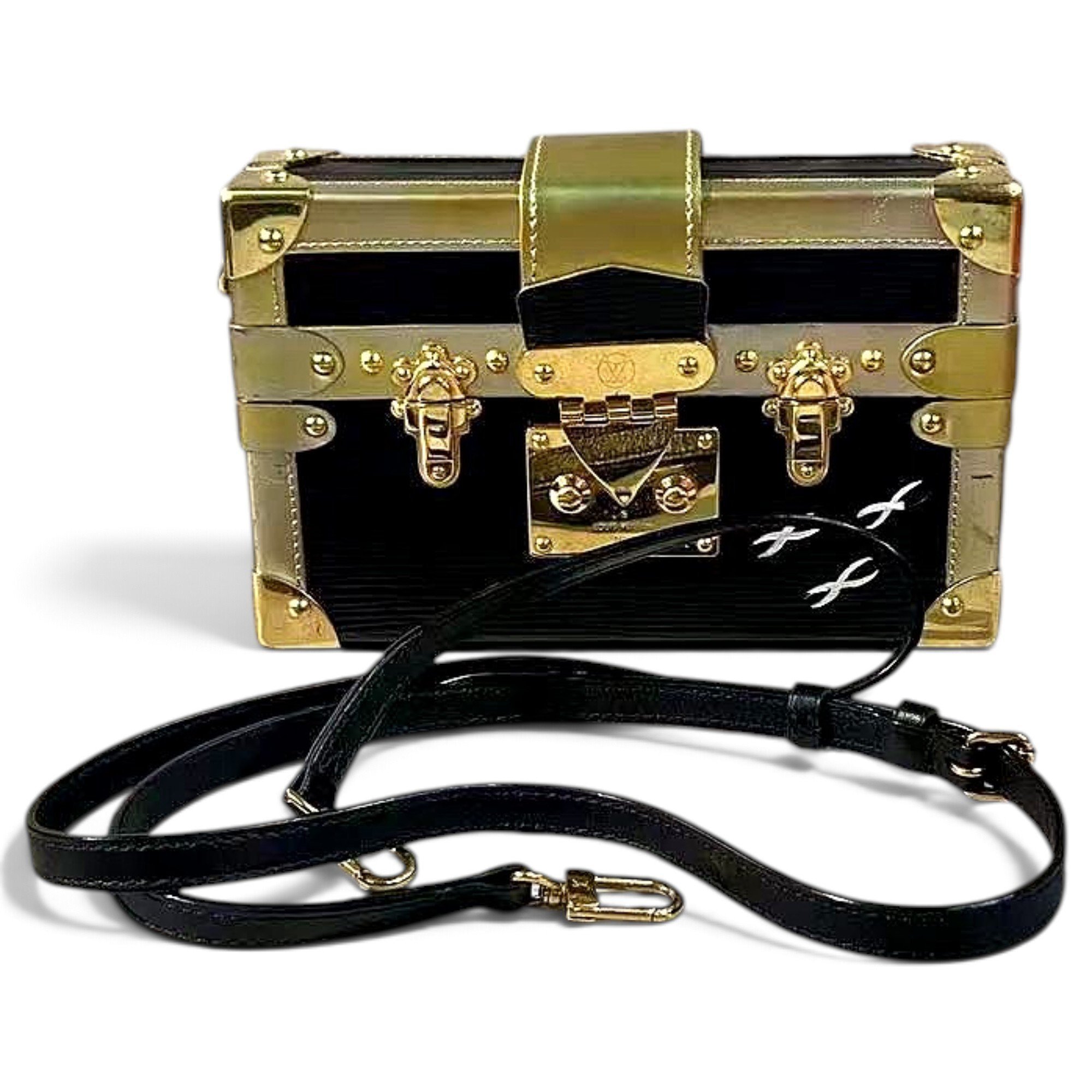 Pochette Trunk leather handbag