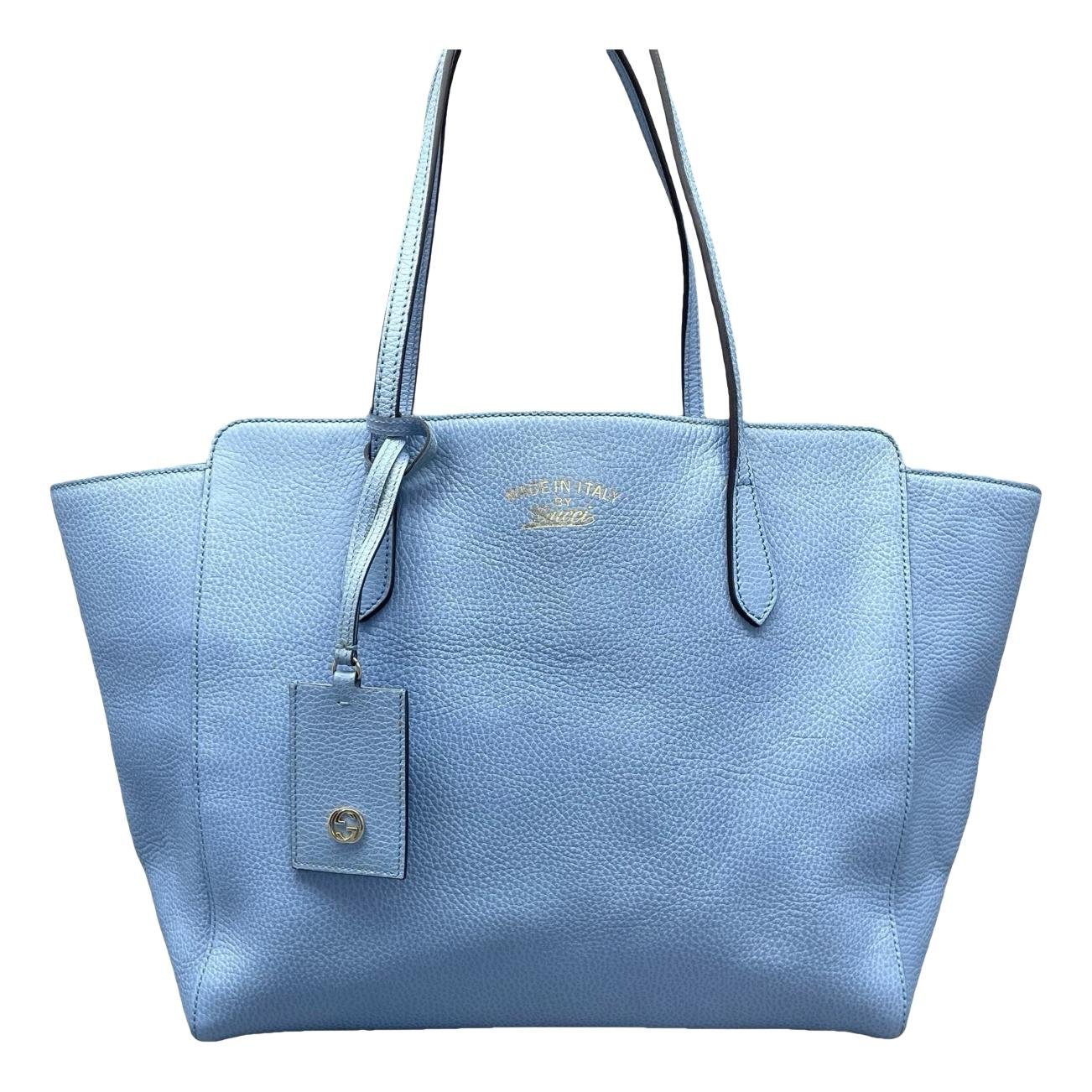 Swing leather handbag