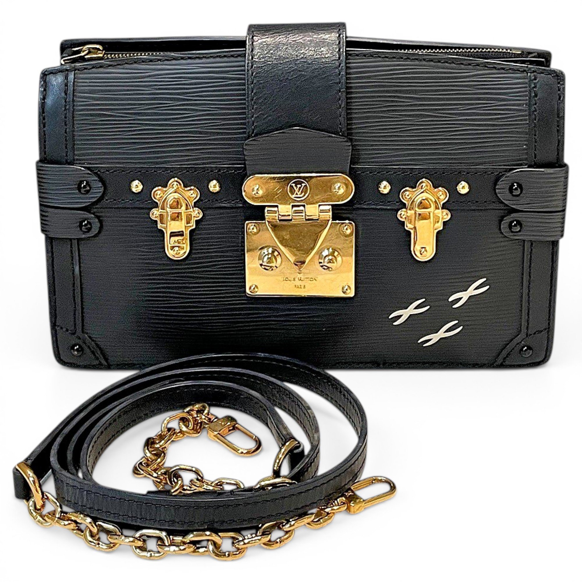 Pochette Trunk leather handbag