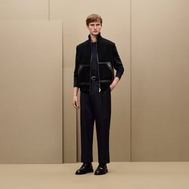 Vest with leather details	