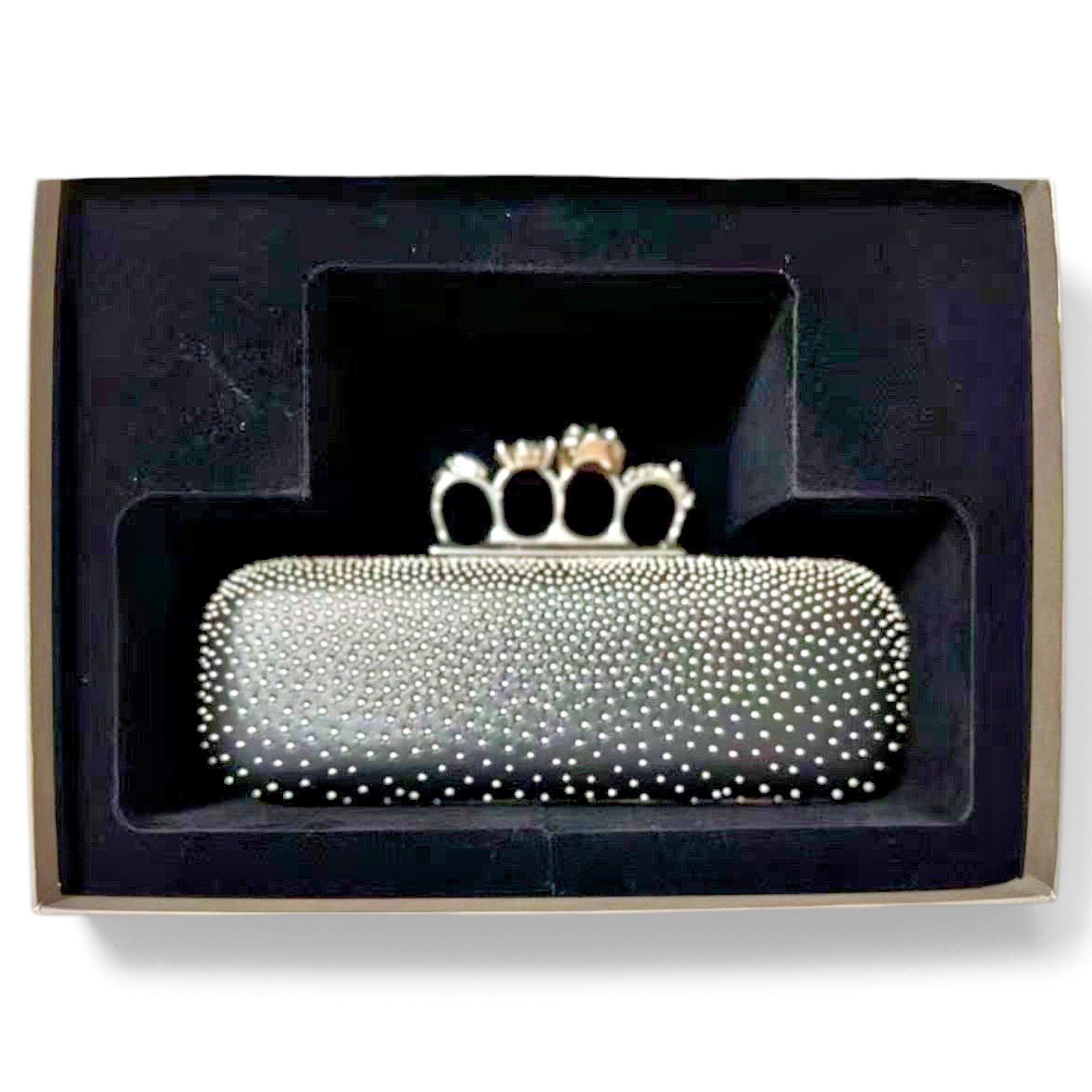 Knuckle clutch bag