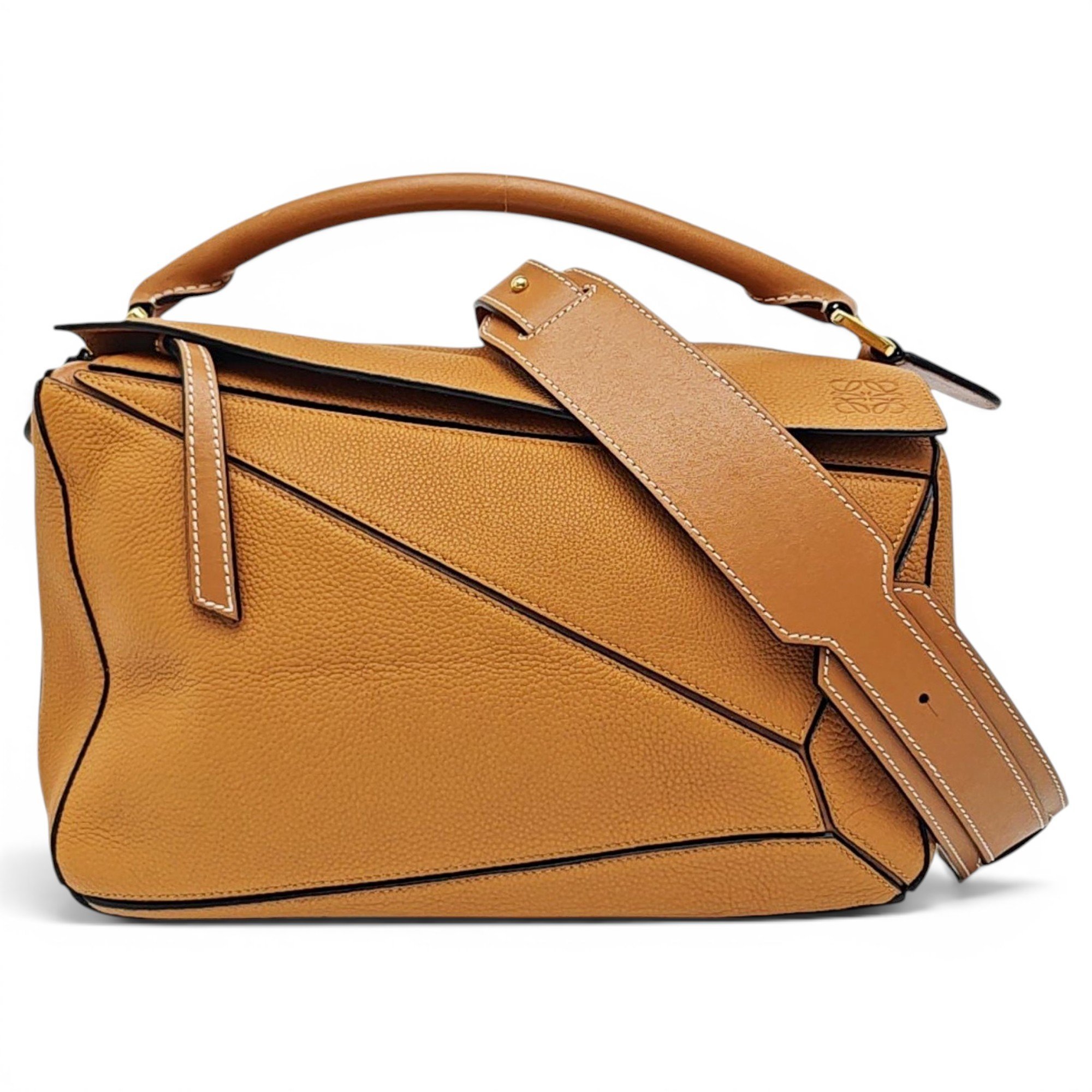 Puzzle leather handbag