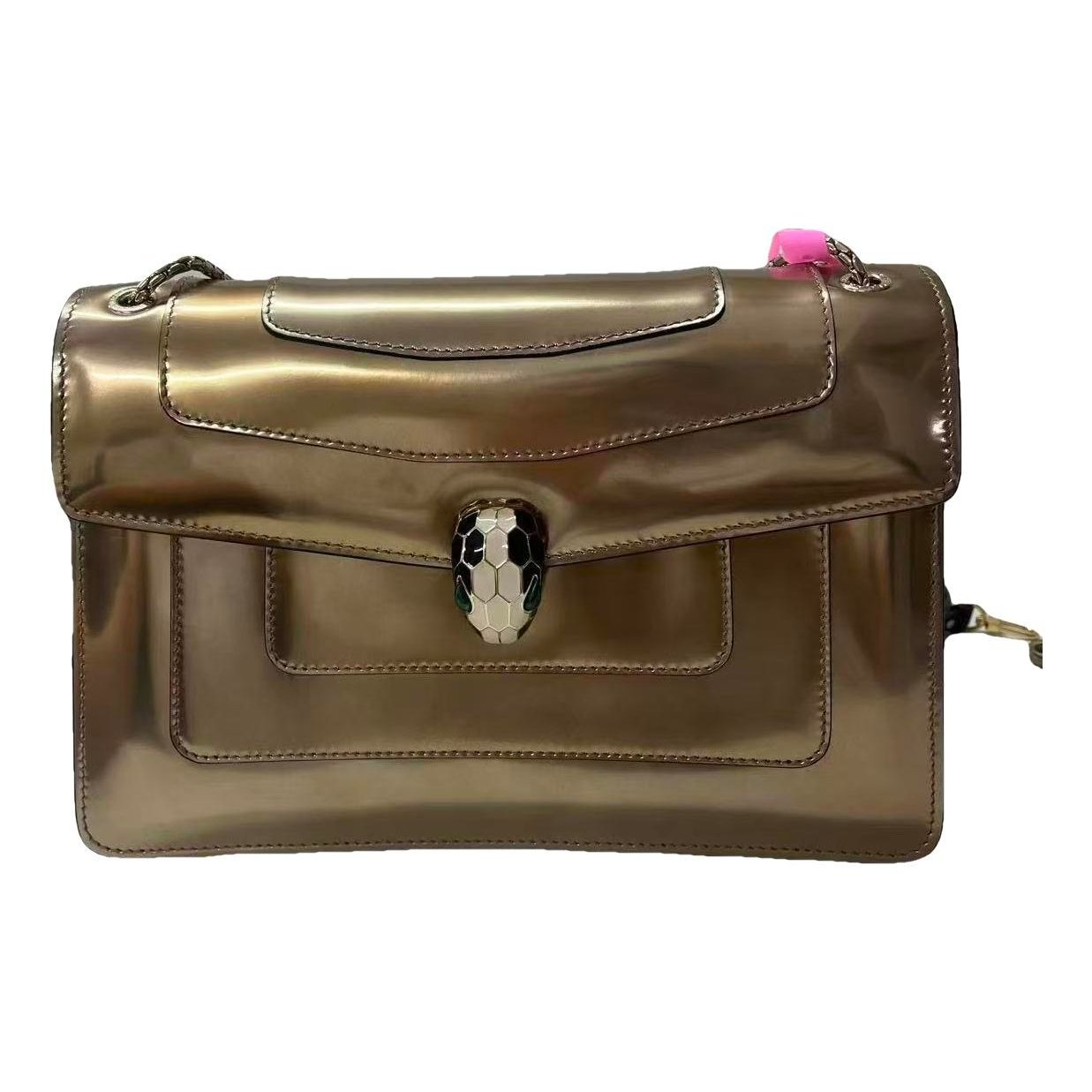 Serpenti leather handbag